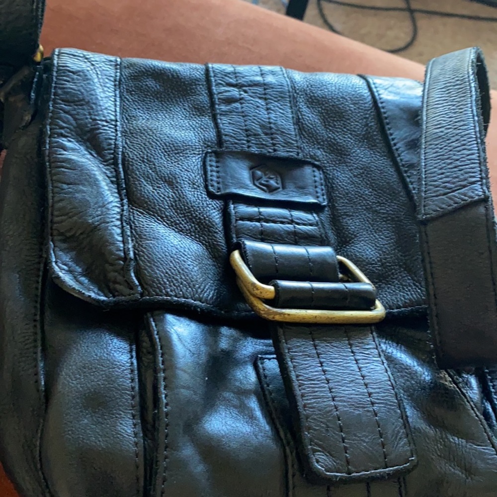 Unworn- clean inside purse
